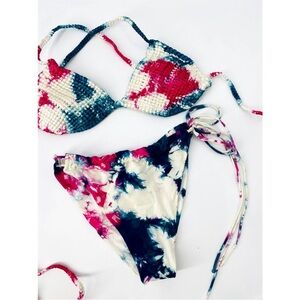 Entreaguas Wearable Art crocheted string bikini two piece adjustable swimsuit